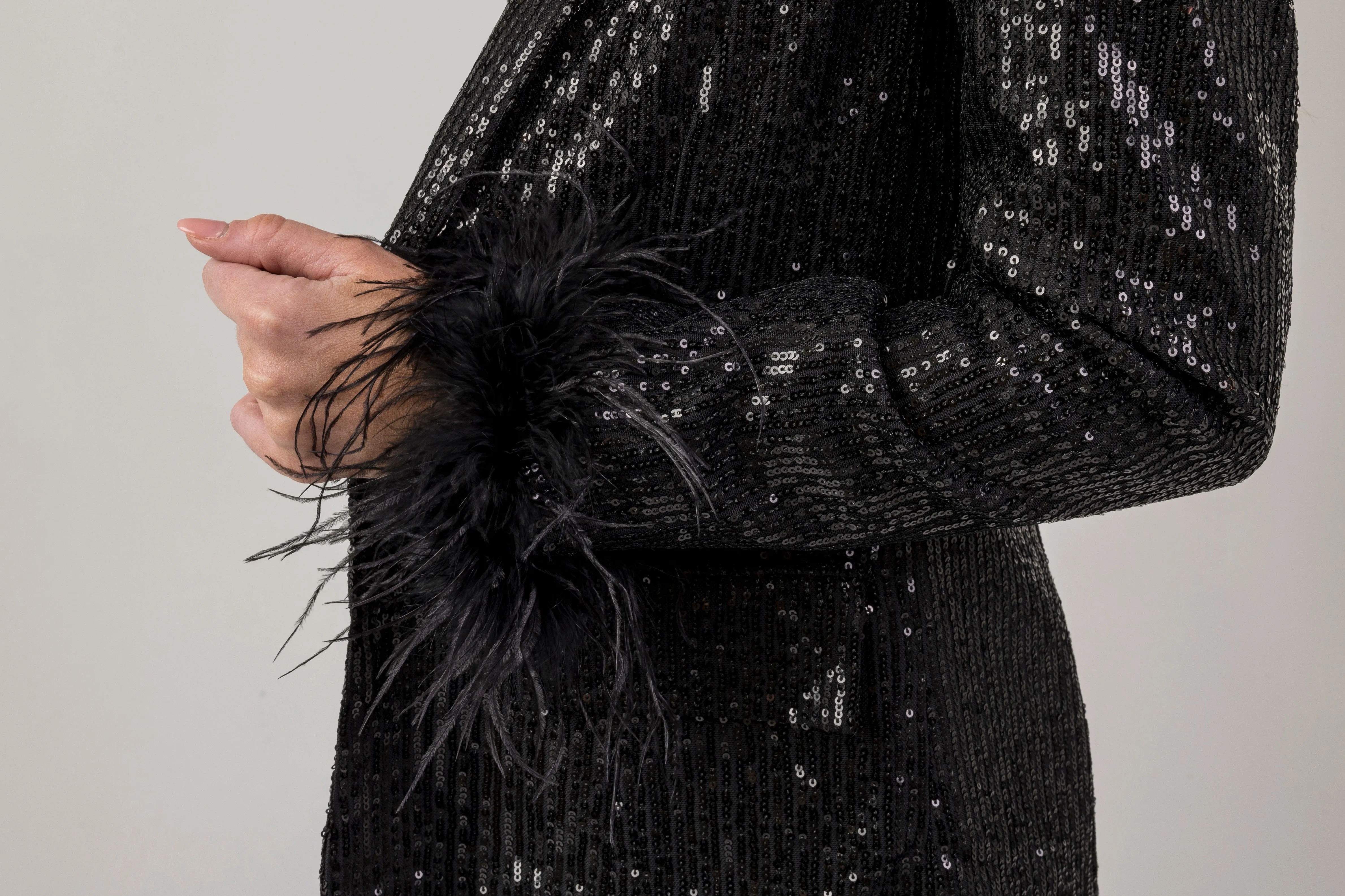 Sparkle blazer with feather cuff